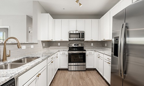 kitchen with white cabinets