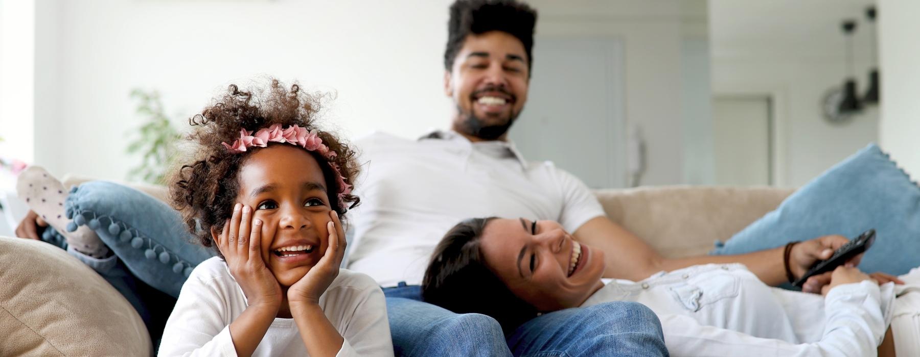 a group of people sitting on a couch