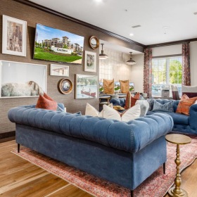 a living room with a blue couch